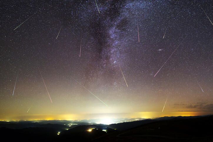 Purple Milky way falling stars city