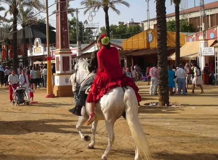 mujer caballo feria