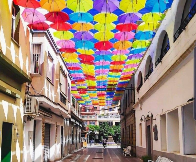 Calle cadalso paraguas